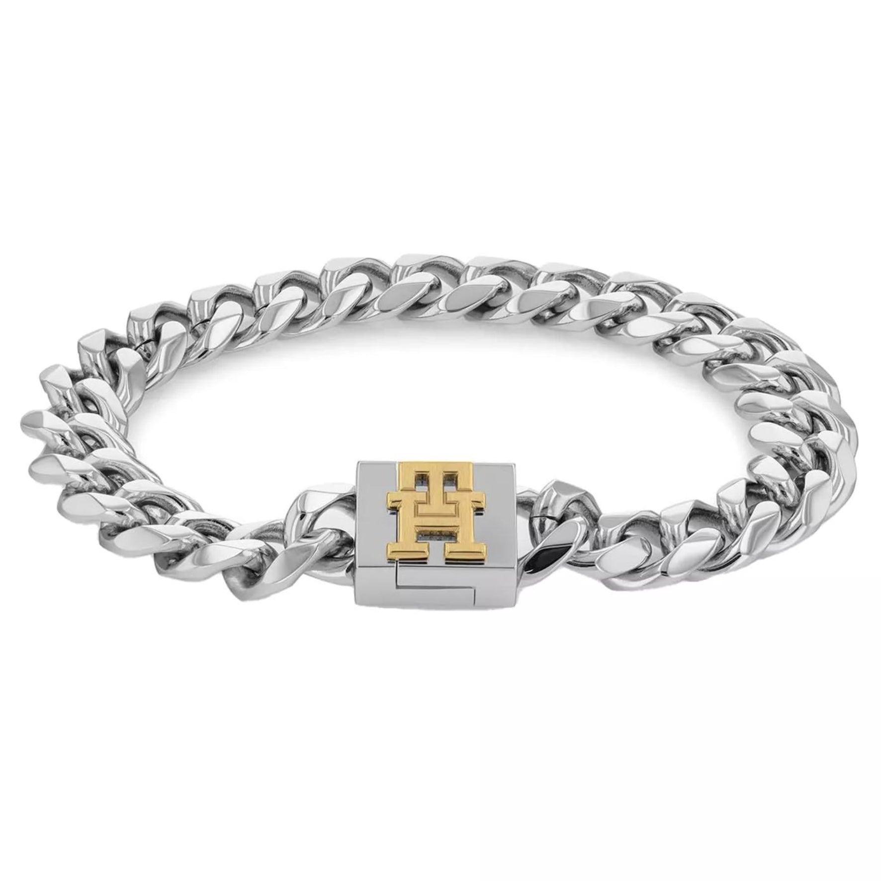 Ανδρικό βραχιόλι ατσάλινο 2790421 σε ασημένιο χρώμα με πλέξη μπρασελέ και εγγράφα με χρυσό λογότυπο Tommy Hilfiger.