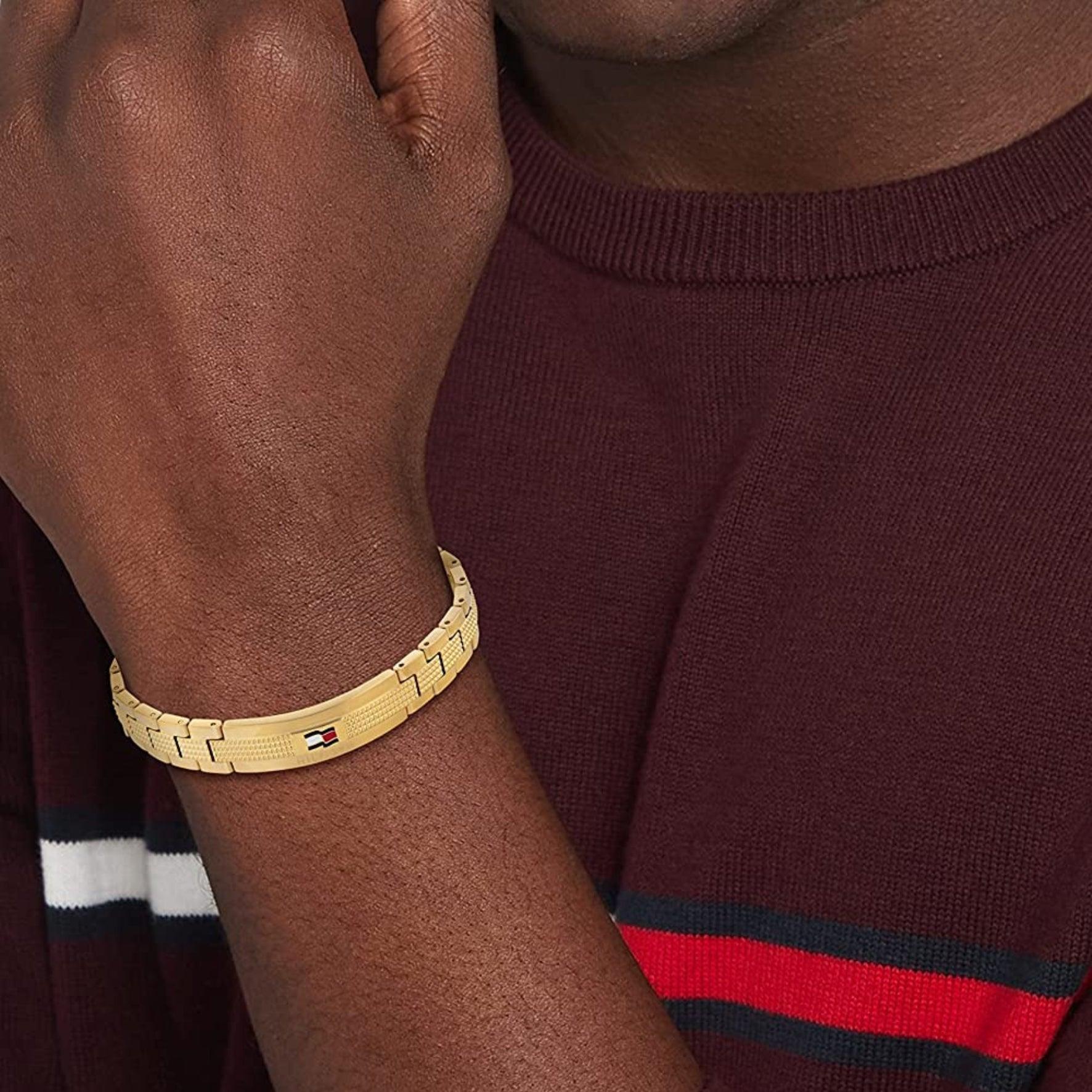 Ανδρικό βραχιόλι ατσάλινο Tommy Hilfiger TH2790421 σε χρυσό χρώμα.