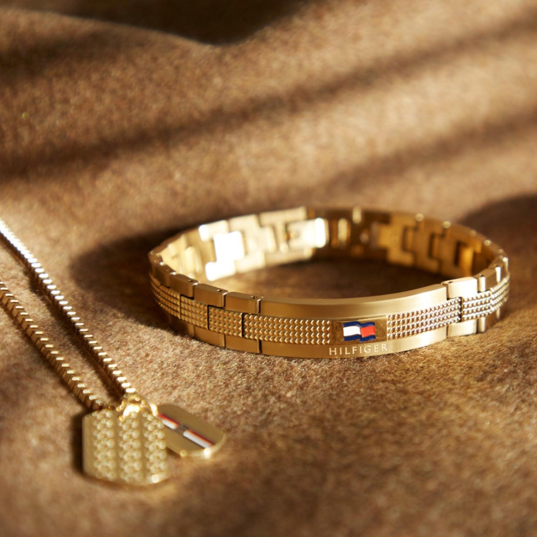 Ανδρικό βραχιόλι ατσάλινο Tommy Hilfiger TH2790421 σε χρυσό χρώμα.