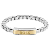 Ανδρικό βραχιόλι Boss 1580597M ατσάλινο δίχρωμο με ασημί μπρασελέ και χρυσό στοιχείο, κατασκευασμένο από χειρουργικό ατσάλι σε σχέδιο μπρασελέ.