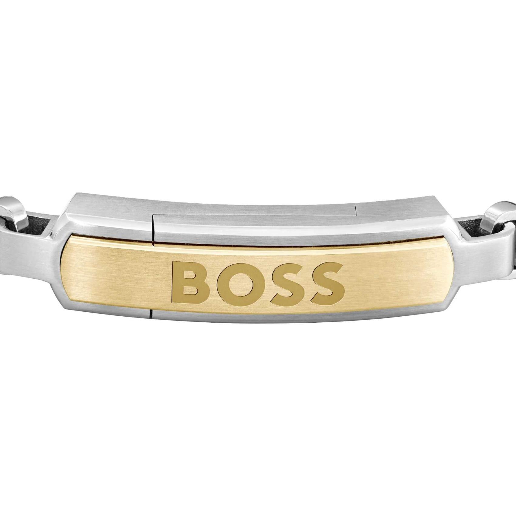 Ανδρικό βραχιόλι Boss 1580597M ατσάλινο δίχρωμο με ασημί μπρασελέ και χρυσό στοιχείο, κατασκευασμένο από χειρουργικό ατσάλι σε σχέδιο μπρασελέ.