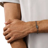 Ανδρικό βραχιόλι Emporio Armani EGS3173001 από ανοξείδωτο ατσάλι σε ανθρακί χρώμα με διπλή αλυσίδα και μαύρα ζιργκόν- Φορεμένο