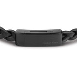 Ανδρικό βραχιόλι Calvin Klein 35000129 από μαύρο δέρμα με διαγώνια πλέξη και μαύρη αγκράφα.