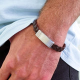 Ανδρικό βραχιόλι Calvin Klein 35000131 από καφέ δέρμα με ασημένια αγκράφα.