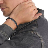 Ανδρικό βραχιόλι Calvin Klein 35000406 από μαύρο δέρμα με μαύρη αγκράφα.