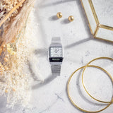 Τετράγωνο ρολόι Casio Vintage AQ-800E-7AEF anadigi με ασημί ατσάλινο μπρασελέ και ασημί τετράγωνο καντράν και αναλογική-ψηφιακή ένδειξη ώρας.