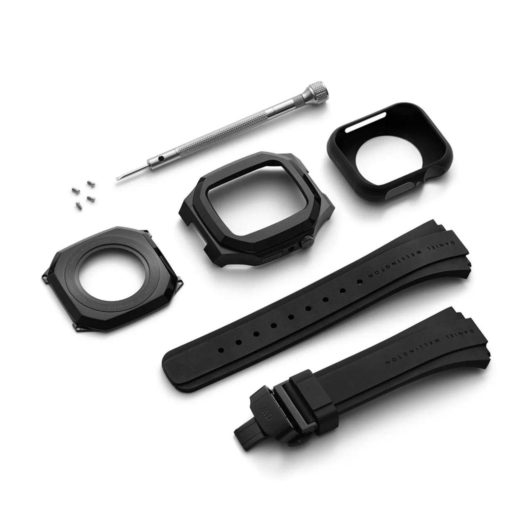 Θήκη smartwatch daniel wellington dw01200003 συμβατή με Apple Watch Series 6, 5, 4 και Apple Watch SE σε μαύρο χρώμα με με μαύρο καουτσούκ λουράκι και τετράγωνο σχήμα.