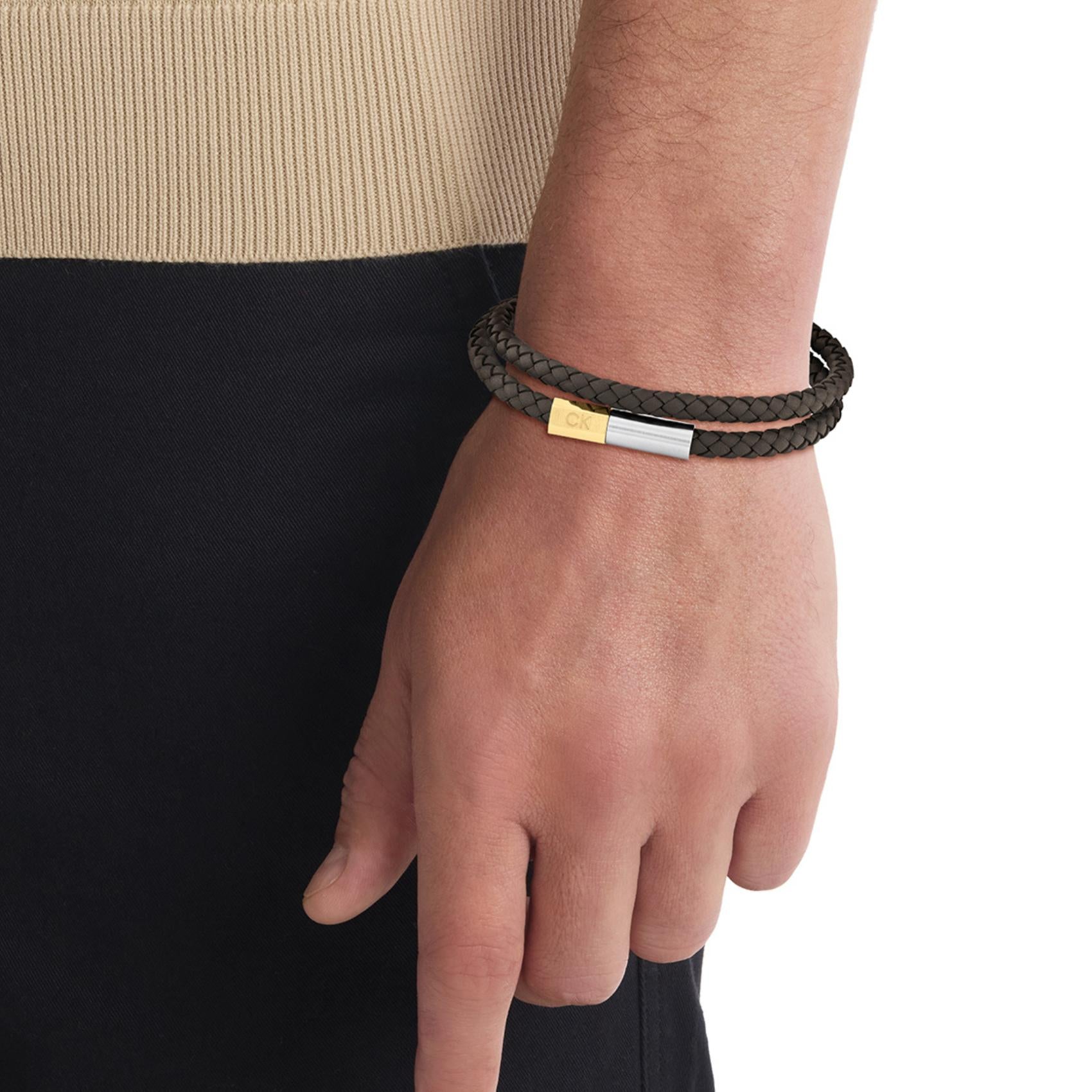 Διπλό βραχιόλι Calvin Klein 35100044 δερμάτινο καφέ με ασημί και χρυσό κούμπωμα.