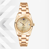 Ρολόι Gant Everett Mini G186006 με χρυσό ατσάλινο μπρασελέ και χρυσό καντράν 28mm με ημερομηνία, σε φόντο.