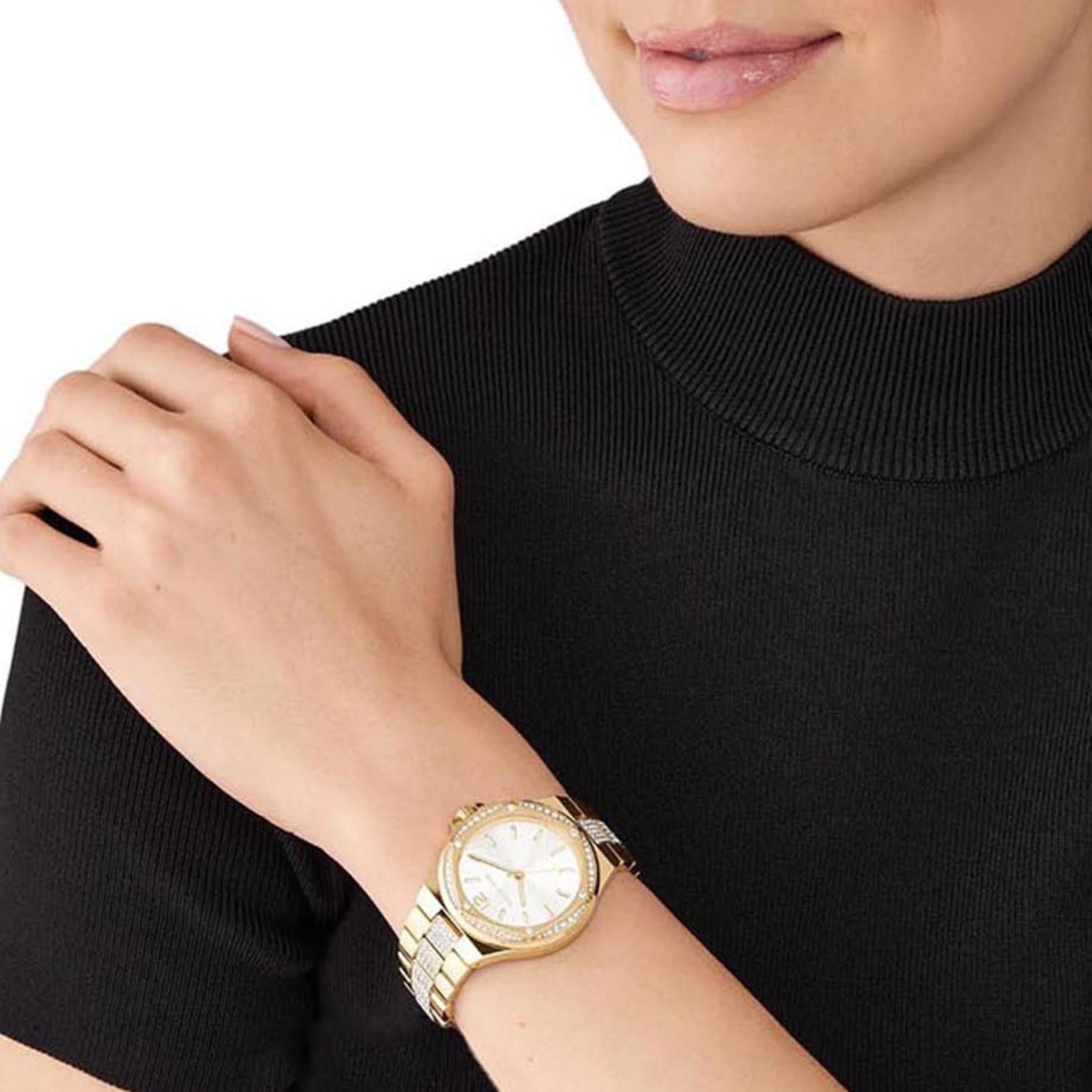 Γυναικείο ρολόι Michael Kors Lennox MK7361 με χρυσό ατσάλινο μπρασελέ και άσπρο καντράν 37mm με ζιργκόν.