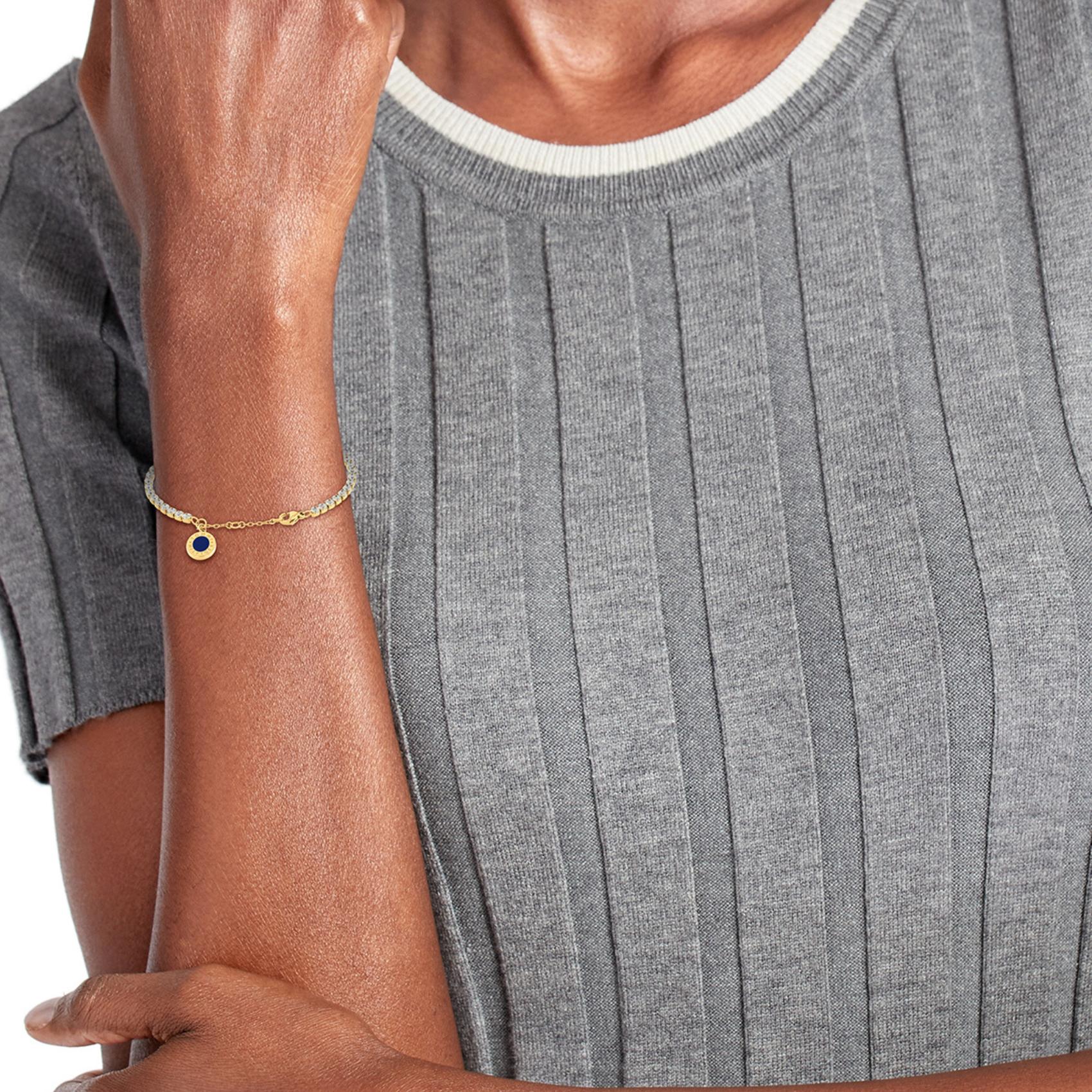 Βραχιόλι Tommy Hilfiger 2780799 ριβιέρα με ζιργκόν και κρεμαστό στοιχείο με μπλε σμάλτο.