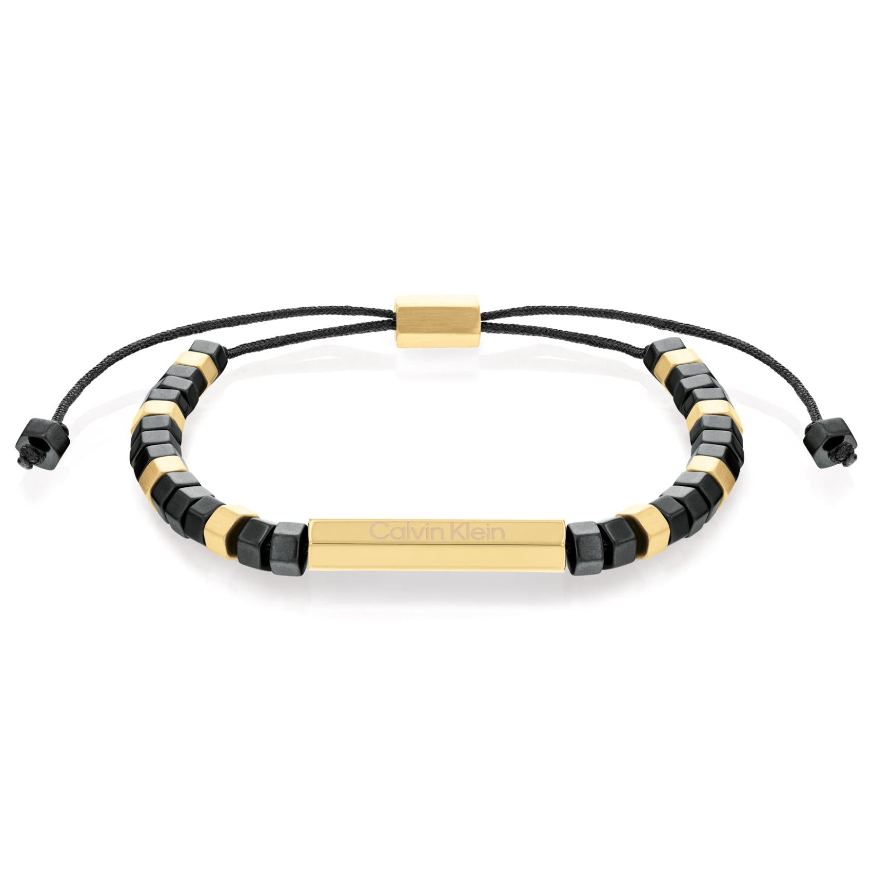 Βραχιόλι Calvin Klein 35000280 μακραμέ με αιματίτη και ατσάλινα στοιχεία σε χρυσό χρώμα.