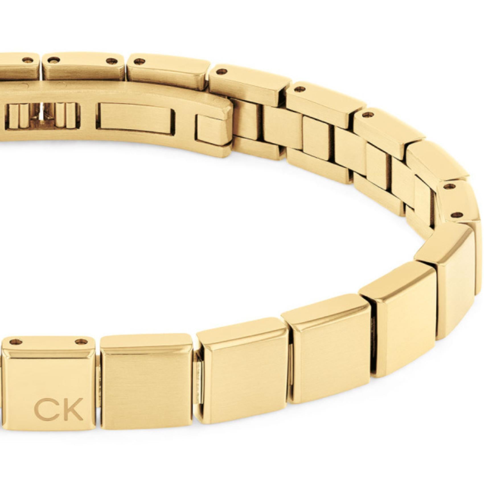 Ατσάλινο βραχιόλι χειροπέδα calvin klein 35000489 σε χρυσό χρώμα.