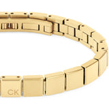 Ατσάλινο βραχιόλι χειροπέδα calvin klein 35000489 σε χρυσό χρώμα.