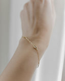 Βραχιόλι χρυσό με ματάκι και σταυρό BT5102.013