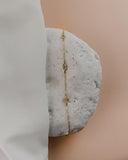 Βραχιόλι χρυσό με ματάκι και σταυρό BT5102.013