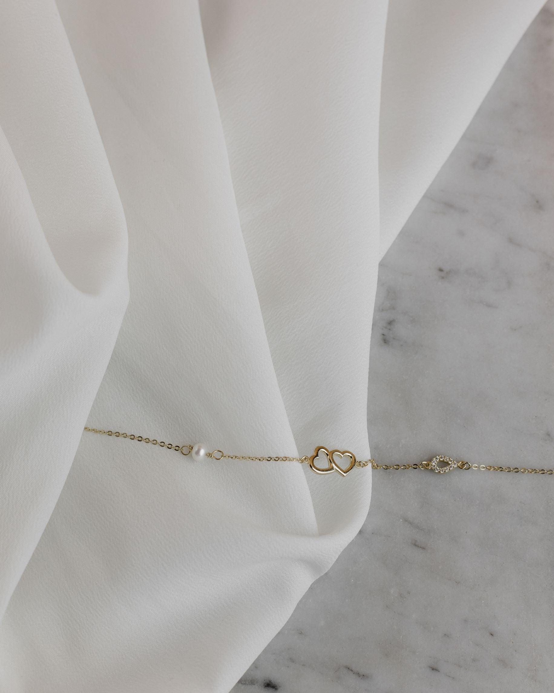 Βραχιόλι χρυσό με καρδιές