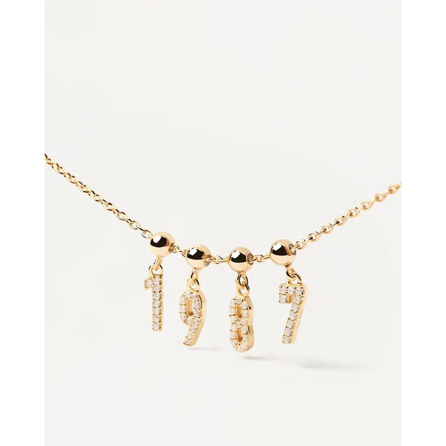 PD Paola Charms με αριθμούς, από ασήμι επιχρυσωμένο με λευκά ζιγκόν.