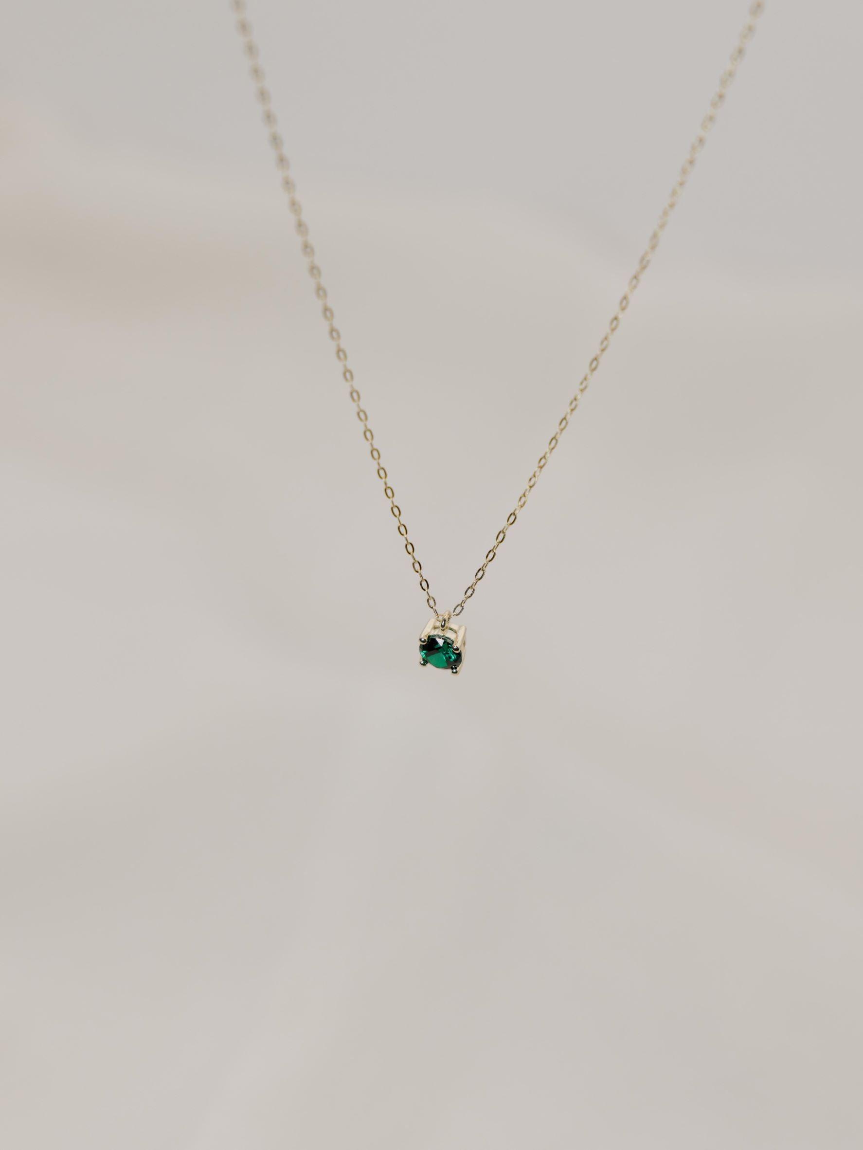 Χρυσό κολιέ Κ14 με Πράσινο Ζιργκόν