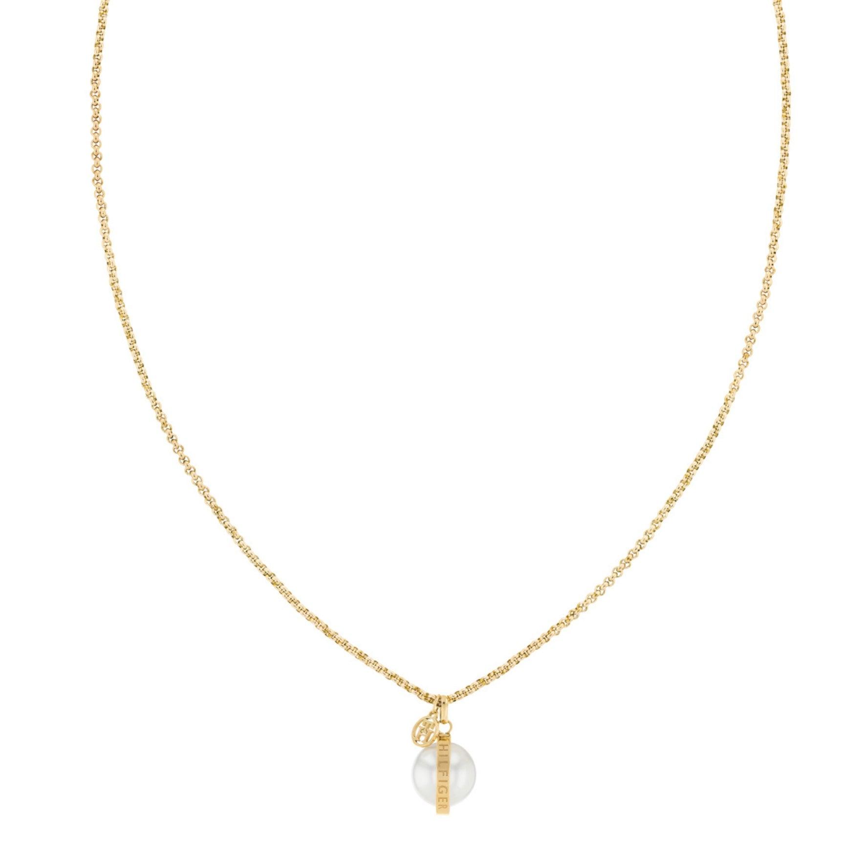 Γυναικείο κολιέ Tommy Hilfiger σε χρυσό χρώμα, με στρογγυλό μοτίφ από λευκό φίλντισι.