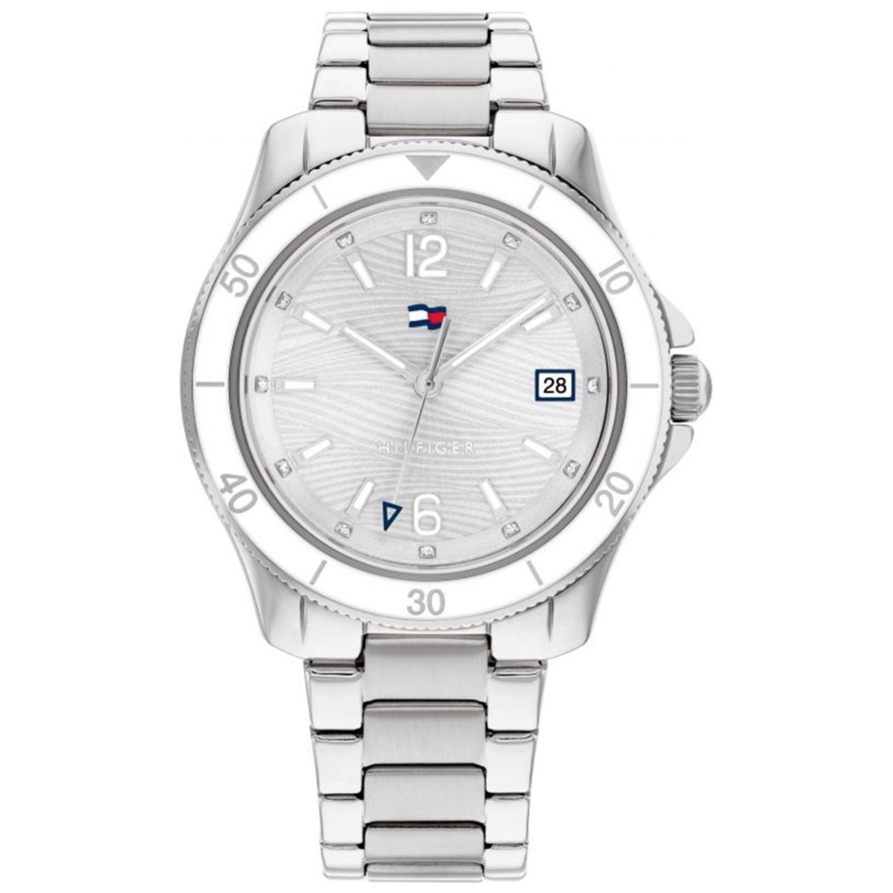 Γυναικείο ρολόι Tommy Hilfiger Brooke 1782512, με μπρασελέ σε ασημί χρώμα από ανοξείδωτο ατσάλι και ασημί καντράν με λειτουργία ημερομηνίας.