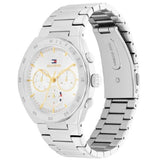 Γυναικείο ρολόι Tommy Hilfiger Carrie 1782573, με μπρασελέ σε ασημί χρώμα από ανοξείδωτο ατσάλι και λευκό καντράν με χρονογράφους και δείκτες σε χρυσό χρώμα.