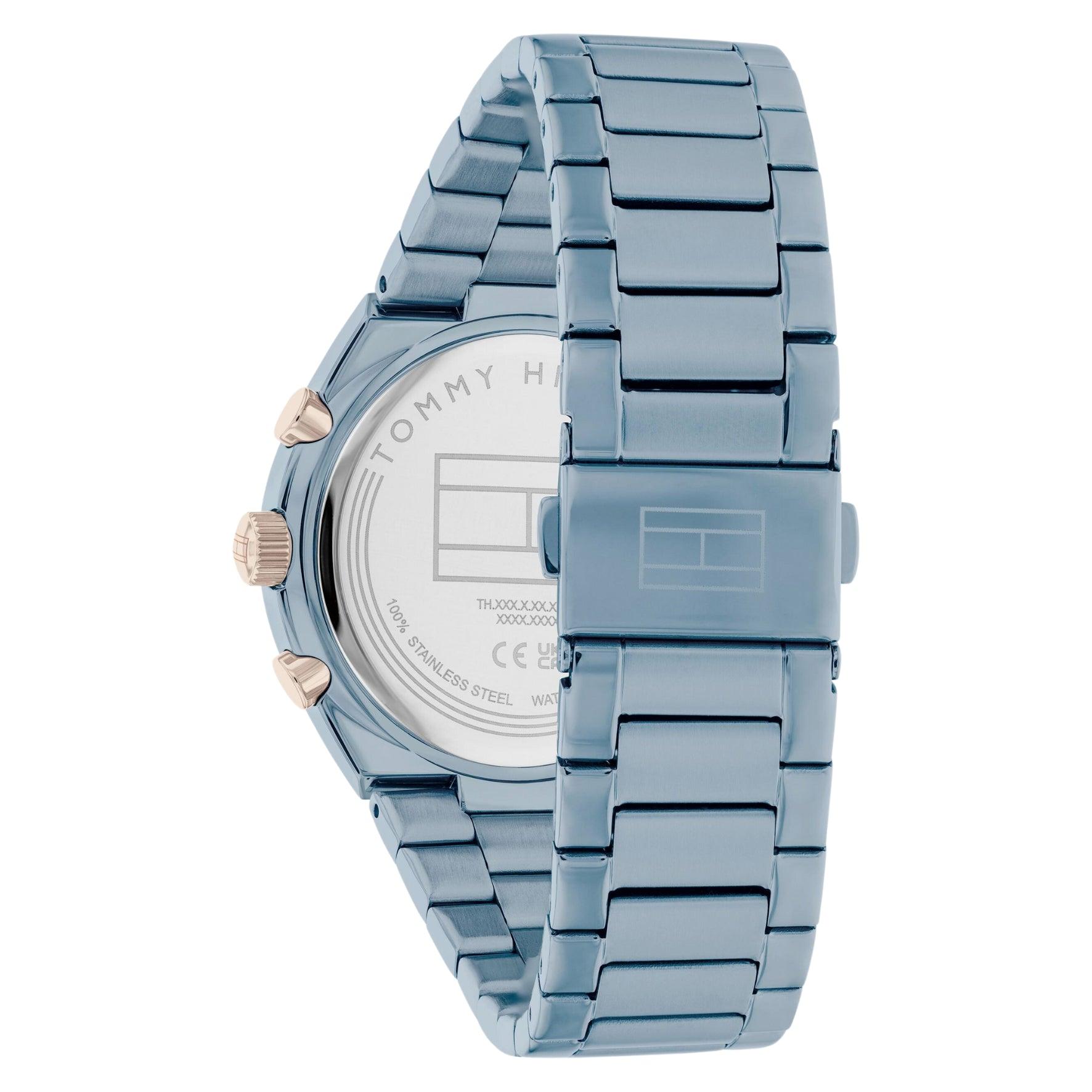 Γυναικείο ρολόι Tommy Hilfiger Carrie 1782576, με μπρασελέ σε μπλε χρώμα από ανοξείδωτο ατσάλι και μπλε καντράν με χρονογράφους και δείκτες σε ροζ χρυσό χρώμα.