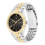 Γυναικείο ρολόι Tommy Hilfiger Monica 1782591, με δίχρωμο μπρασελέ σε ασημί-χρυσό χρώμα από ανοξείδωτο ατσάλι και μαύρο καντράν με χρονογράφους.