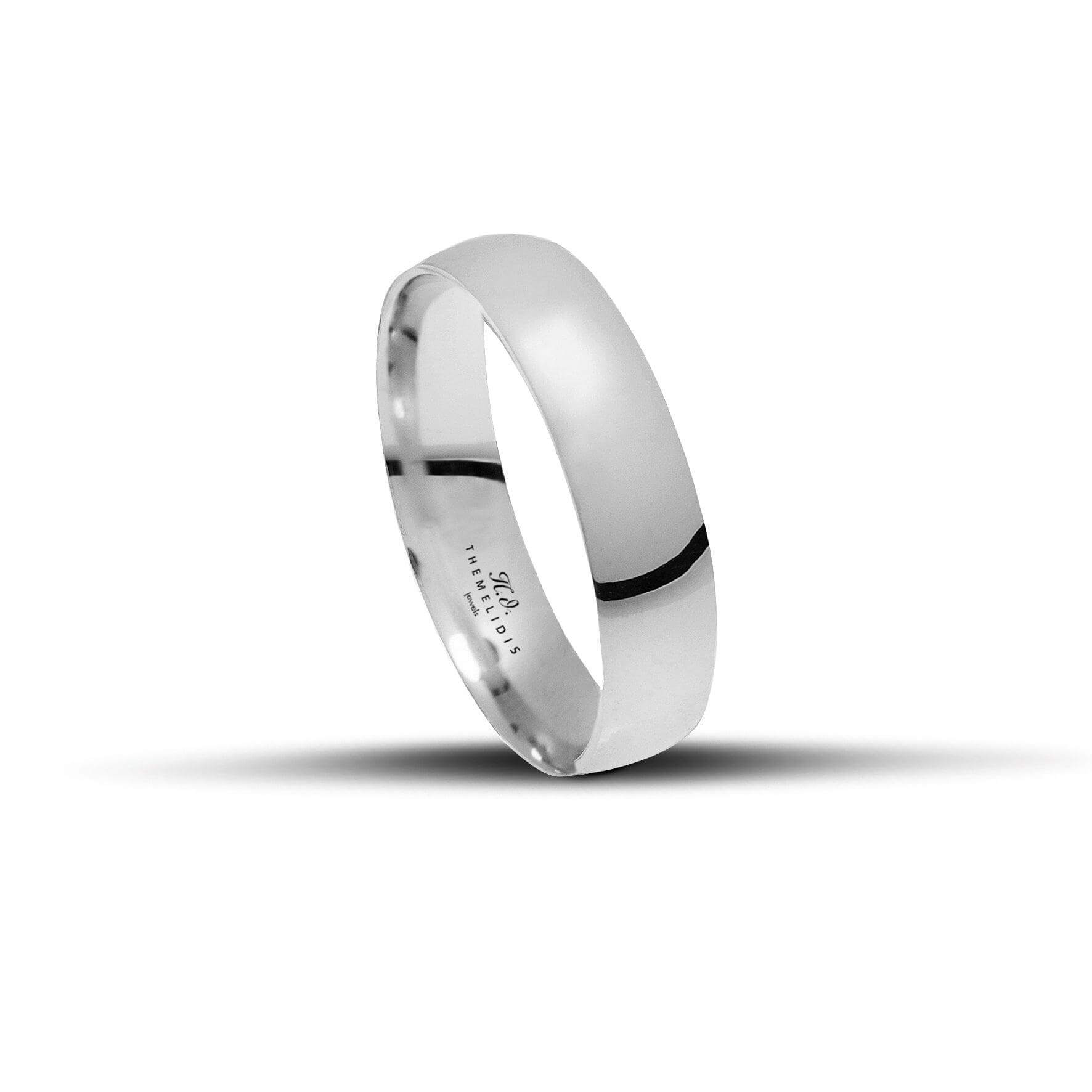 Κλασική βέρα γάμου από λευκόχρυσο με γυαλιστερή επιφάνεια. Πλάτος 5mm με ανατομικό σχεδιασμό.