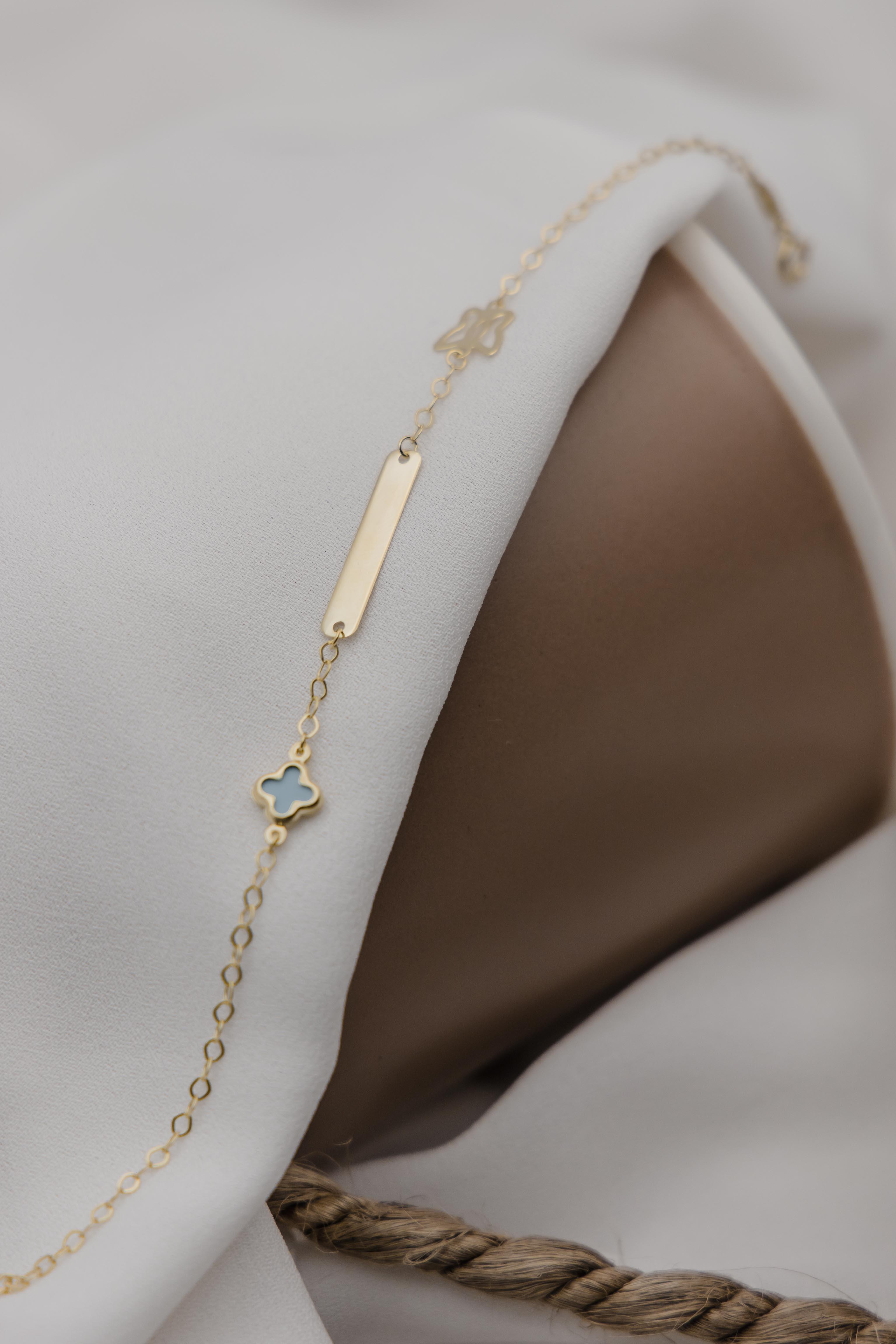 Χρυσή ταυτότητα Κ9 με μπλε σταυρουδάκι και πεταλούδα