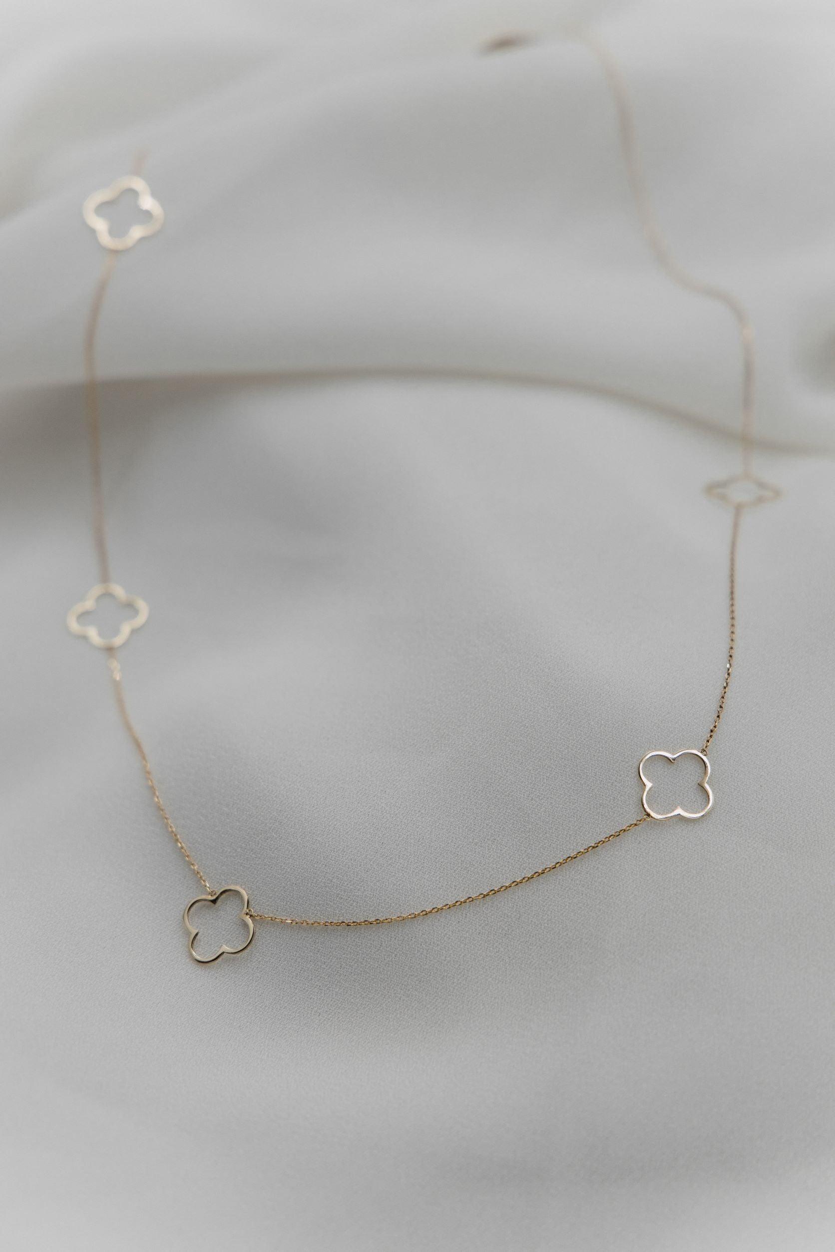 Χρυσό κολιέ Κ14 μακρύ με σταυρούς