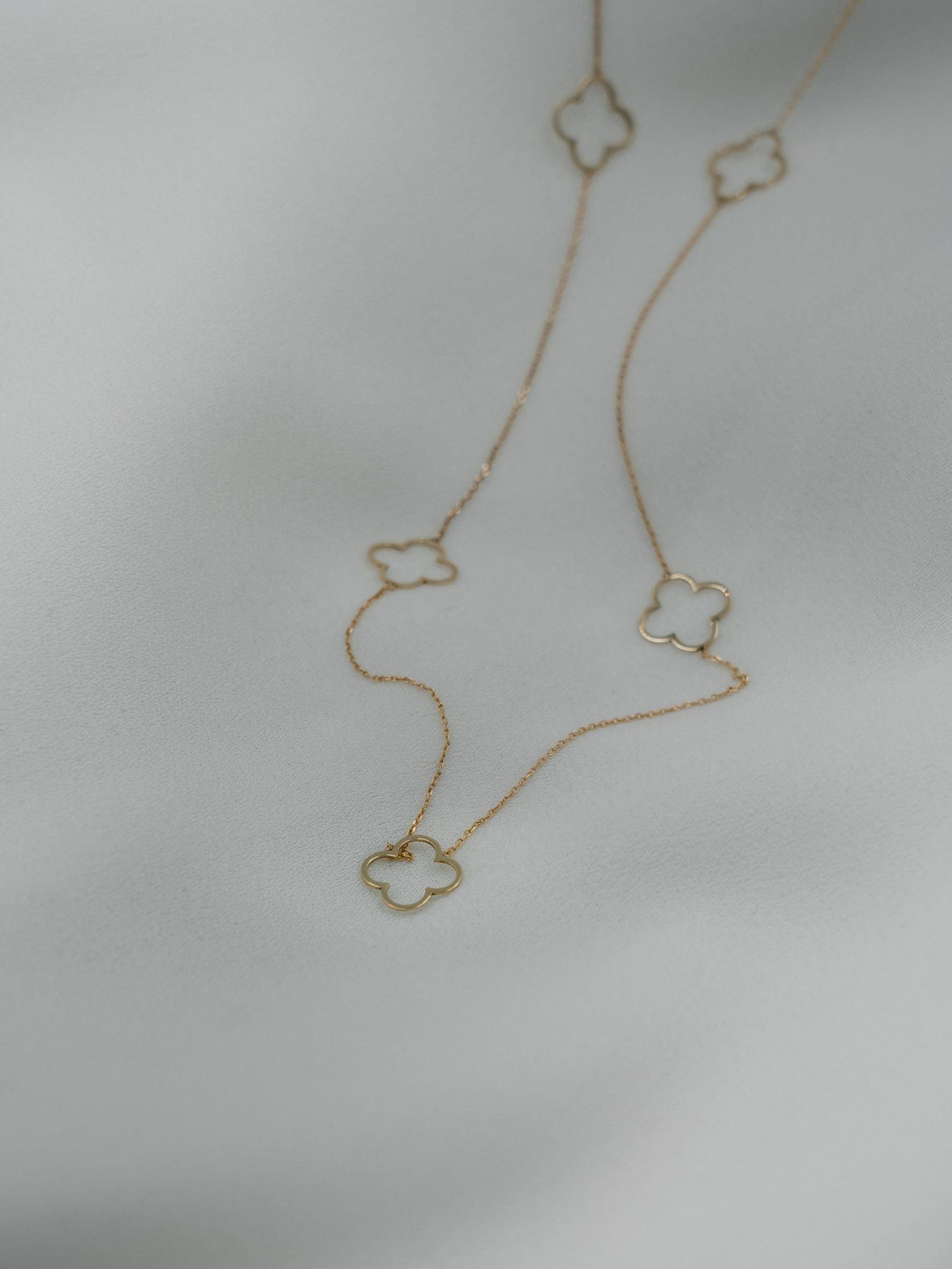 Χρυσό κολιέ Κ14 μακρύ με σταυρούς