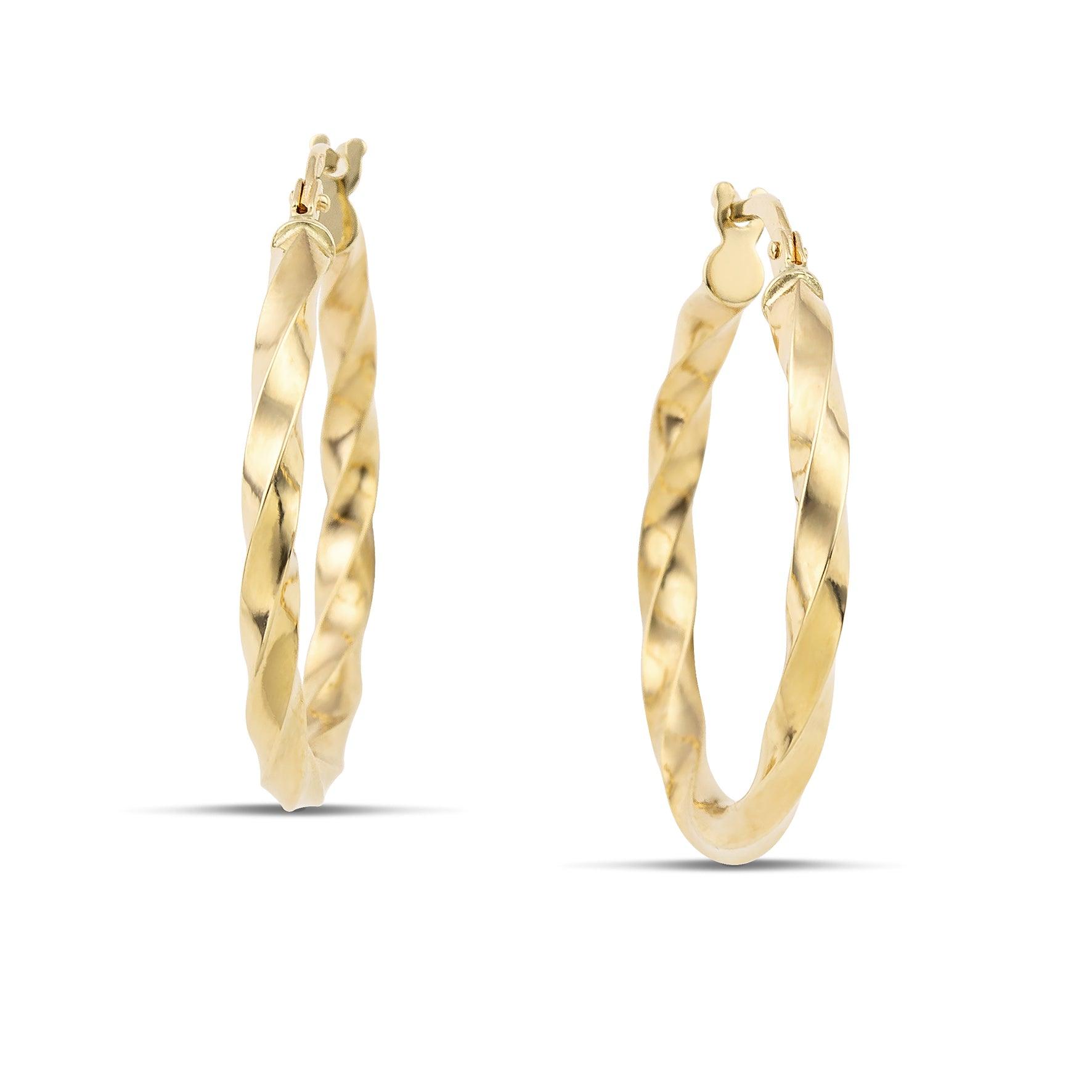 Σκουλαρίκια κρίκοι από χρυσό 14 καρατίων, με στριφτό σχέδιο.