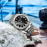 Καταδυτικό ρολόι Roamer Deep Sea 200 860833-41-55-70, με μπρασελέ σε ασημί χρώμα από ανοξείδωτο ατσάλι και μαύρο καντράν με ένδειξη ημερομηνίας.