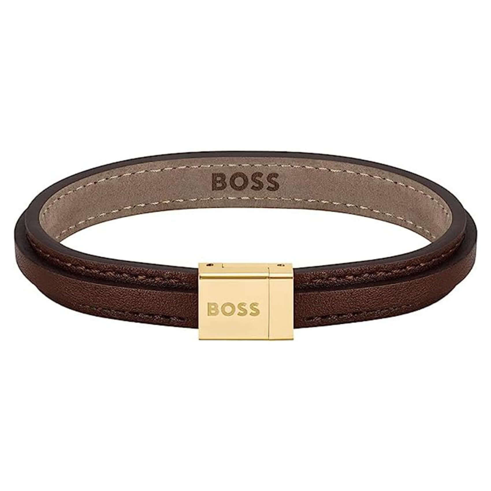 Ανδρικό δερμάτινο βραχιόλι Boss 1580329S σε μαύρο χρώμα με κούμπωμα από ανοξείδωτο ατσάλι σε χρυσό χρώμα.