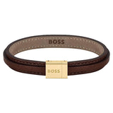 Ανδρικό δερμάτινο βραχιόλι Boss 1580329S σε μαύρο χρώμα με κούμπωμα από ανοξείδωτο ατσάλι σε χρυσό χρώμα.