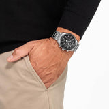 Ανδρικό ρολόι Citizen Eco-Drive Tsuki-yomi BY1018-80E φορεμένο με ασημί μπρασελέ από τιτάνιο και μαύρο καντράν.