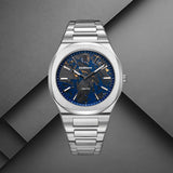 Ανδρικό ρολόι D1 Milano Carbon Reef D1-UHBJ04 σε studio background με ασημί ατσάλινο μπρασελέ και μπλε καντράν.
