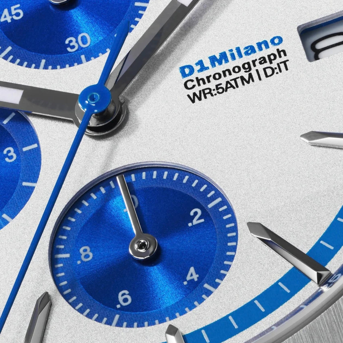 Λευκό-μπλε καντράν ρολογιού D1 Milano Chrono D1-CHBJ26 διαμέτρου 39mm με ένδειξη ημερομηνίας και χρονογράφο