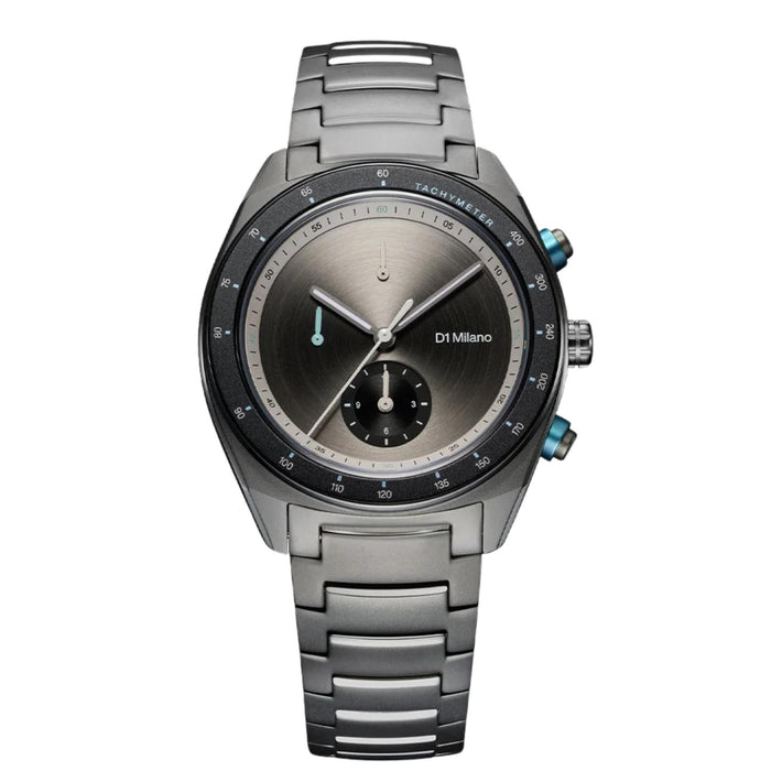 Ανδρικό Ρολόι D1 Milano Essential Chronograph D1-CHBJ21 ανδρικό με μπρασελέ από ανοξείδωτο ατσάλι σε ανθρακί απόχρωση, καντράν ανθρακί Ø40 mm, κάσα από ατσάλι με gun metal φινίρισμα, ζαφείρι κρύσταλλο και μηχανισμό Quartz EPSON YM92.