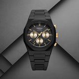 Ανδρικό ρολόι D1 Milano Gilded Solar D1-PHBJ16 με μαύρο πολυκαρμπονικό μπρασελέ και μαύρο καντράν με χρυσές λεπτομέρειες.