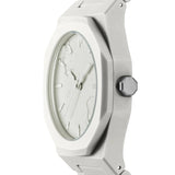 Κοντινό στο γκρι broken-texture καντράν του D1 Milano D1-PCBJ40 με grey brass δείκτες.