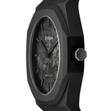 Κοντινό στο μαύρο καντράν του D1 Milano D1-PCBJCR με minimal δείκτες και ορυκτό κρύσταλλο.