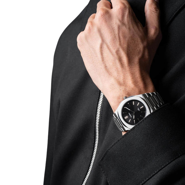 Ρολόι D1 Milano Ultra Thin Groovy Black 39 mm D1-UHBJ01 Με Ασημί Μπρασελέ