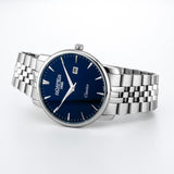 Ρολόι Roamer Classico Gents 971856-41-45-50 με ασημί ατσάλινο μπρασελέ και μπλε καντράν διαμέτρου 40mm.