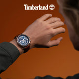 Το Timberland Bernardston TDWGF0054602 φορεμένο στον καρπό με καφέ δερμάτινο λουράκι και μπλε καντράν