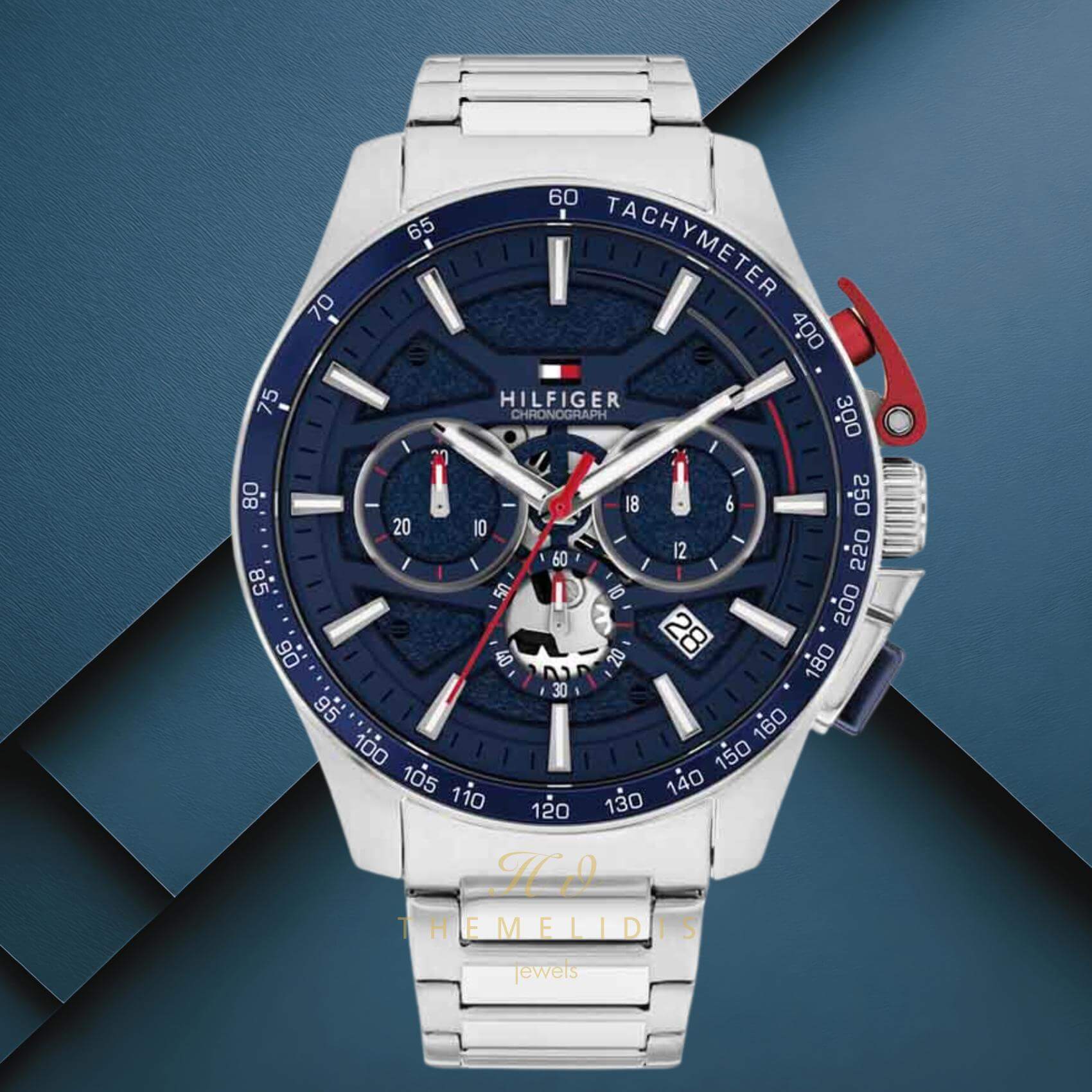 Φωτογραφία του ανδρικού ρολογιού Tommy Hilfiger Bank 1792261 χρονογράφος με ασημί ατσάλινο μπρασελέ, μπλε καντράν με κόκκινες λεπτομέρειες και κάσα 44mm