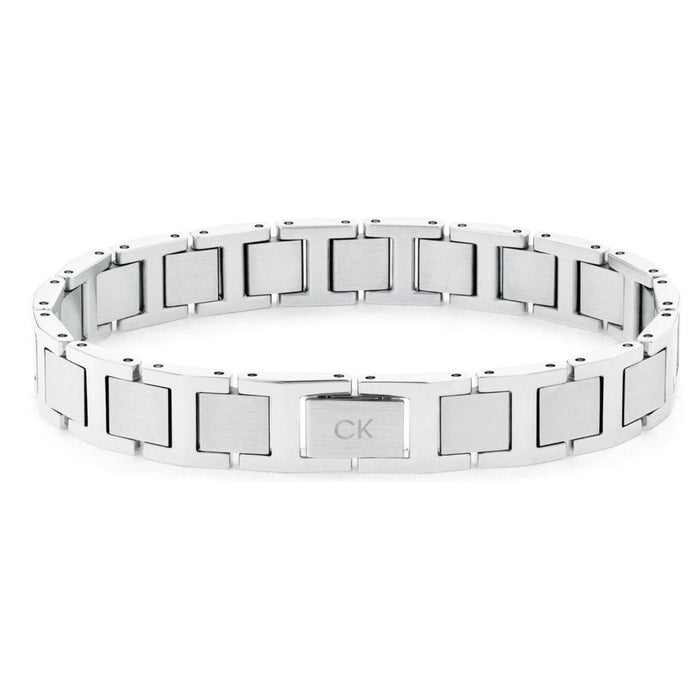 Ανδρικό βραχιόλι Calvin Klein 35100008 από ανοξείδωτο ατσάλι σε ασημί χρώμα, με σχέδιο μπρασελέ και κούμπωμα ασφαλείας, μήκους 19.5 cm