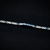 Maserati Diamonds JM125ATY22  - Ανδρικό βραχιόλι από ανοξείδωτο ατσάλι & κεραμικό σε ασημί-μπλε, με διαμαντάκια 0.0135ct και ροζ χρυσή τρίαινα.