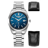 Αυτόματο ρολόι Roamer Elite 970983-41-45-20 box set με ασημί μπρασελέ, μαύρο δερμάτινο λουράκι για αλλαγή & μπλε καντράν διαμέτρου 42mm.